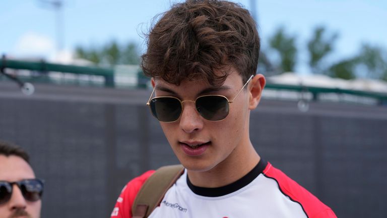Haas driver Oliver Bearman of Britain arrives prior to the first free practice at the Enzo and Dino Ferrari racetrack, ahead the Italy's Emilia Romagna Formula One Grand Prix, in Imola, Italy, Friday, May 16, 2025. (AP Photo/Luca Bruno)