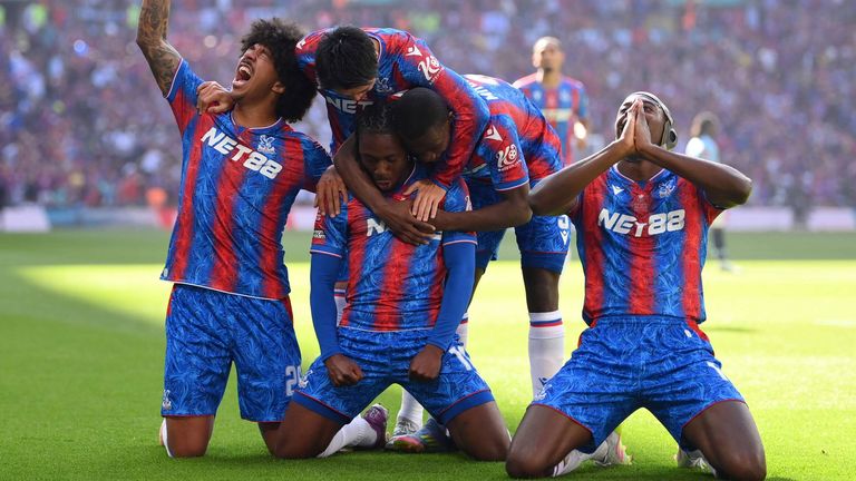 Crystal Palace players celebrate after Eberechi Eze gives them the lead in the FA Cup final
