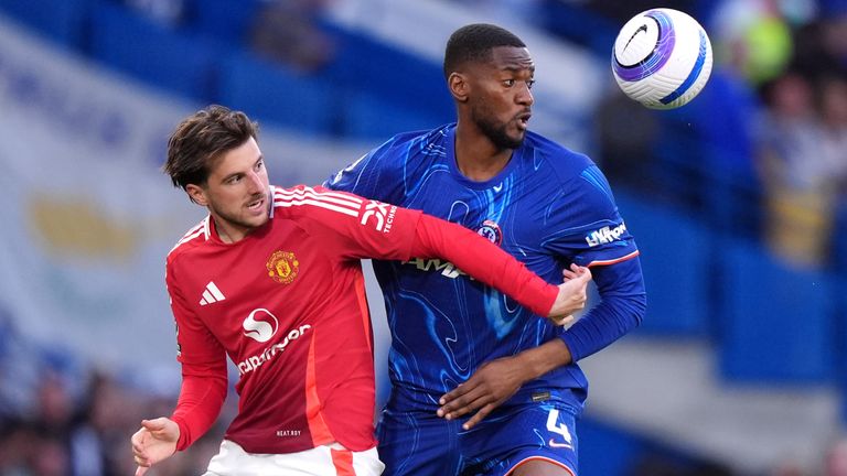 Manchester United's Mason Mount (left) and Chelsea's Tosin Adarabioyo battle for the ball
