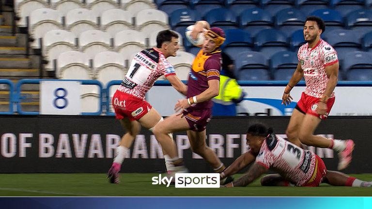 George Flanagan scores a try for Huddersfield Giants against Leigh Leopards