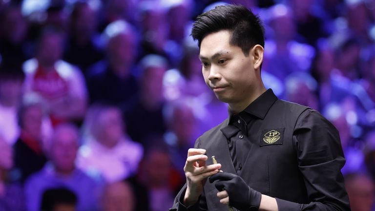 He Guoqiang in action against John Higgins on day four of the 2024 Victorian Plumbing UK Championship at the York Barbican. Picture date: Tuesday November 26, 2024.