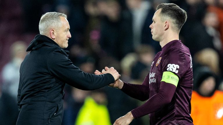 EDINBURGH, SCOTLAND - DECEMBER 19: Hearts head coach Neil Critchley (L) and Lawrence Shankland at full time during a UEFA Conference League 2024/25 League Phase MD6 match between Heart of Midlothian and Petrocub Hincesti at Tynecastle Park, on December 19, 2024, in Edinburgh, Scotland. (Photo by Ross Parker / SNS Group)