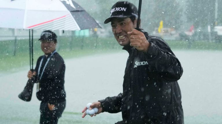 Hideki Matsuyama, of Japan, plays in the rain during a practice round for the PGA Championship golf tournament at the Quail Hollow Club, Monday, May 12, 2025, in Charlotte, N.C. (AP Photo/Matt York) 