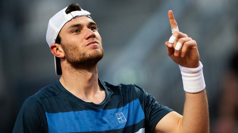 Jack Draper reacts during the men...s single match with Italy...s Luciano Darderi at ATP Rome Open tennis tournament at Foro Italico in Rome on May 9, 2025. (Photo by MARCO BERTORELLO / AFP)