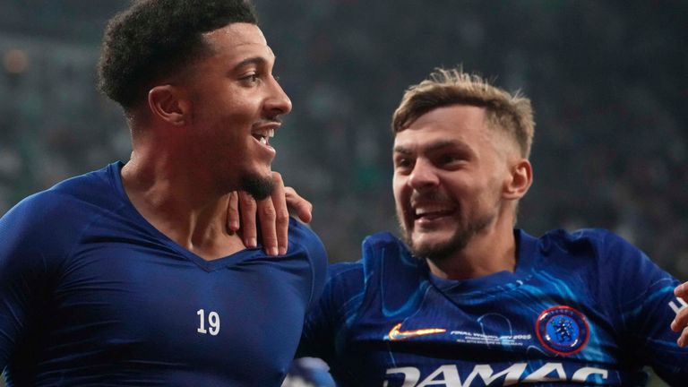 Chelsea's Jadon Sancho, left, celebrates after scoring his side's third goal during the Europa Conference League final soccer match between Real Betis and Chelsea in Wroclaw, Poland, Wednesday, May 28, 2025. (AP Photo/Czarek Sokolowski)