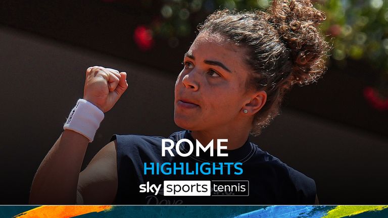 Italy's Jasmine Paolini makes a fist after winning a point against Latvia's Jelena Ostapenko