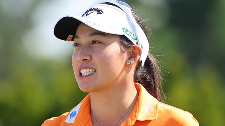 JERSEY CITY, NJ - MAY 11: Jeeno Thitikul of Thailand smiles as she walks off at the first tee during the final round of the Mizuho Americas Open on May 11, 2025 at Liberty National Golf Club in Jersey City, New Jersey. (Photo by Rich Graessle/Icon Sportswire) (Icon Sportswire via AP Images)