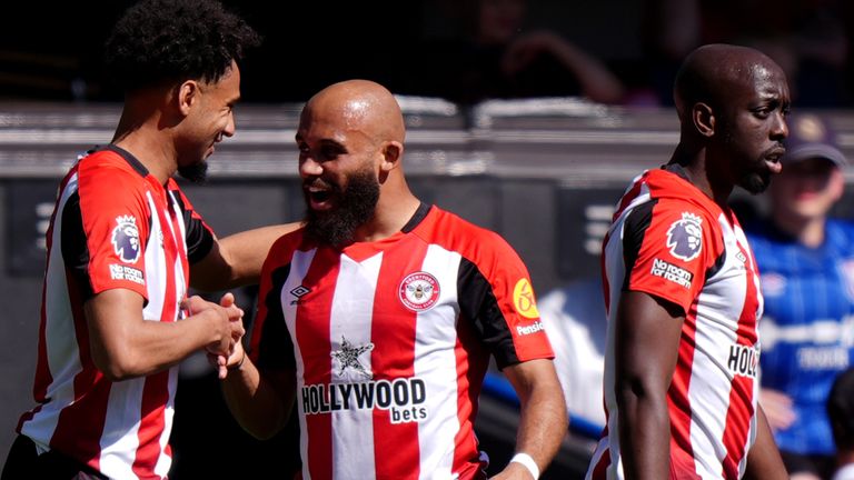 Brentford's Kevin Schade celebrates Bryan Mbeumo