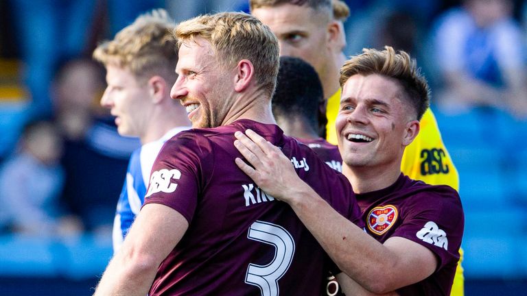 KILMARNOCK, SCOTLAND - MAY 18: Hearts' Stephen Kingsley (L) and Cammy Devlin celebrate at full time during a William Hill Premiership match between Kilmarnock and Heart of Midlothian at Rugby Park, on May 18, 2025, in Kilmarnock, Scotland. (Photo by Alan Harvey / SNS Group)