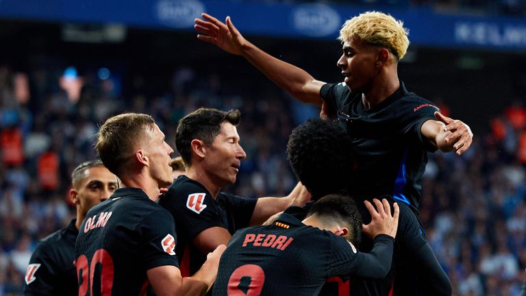 Lamine Yamal celebrates his teammates after registered against Espanyol to put Barcelona in the path of Laliga title