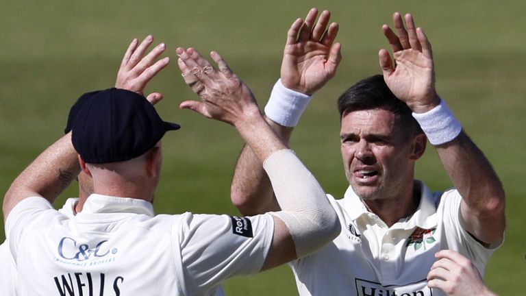 Lancashire's James Anderson is congratulated after taking a wicket