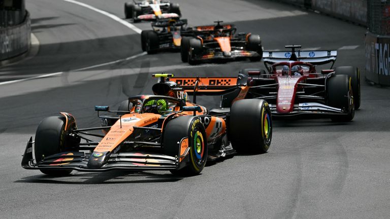 McLaren's British driver Lando Norris (L) leads Ferrari's Monegasque driver Charles Leclerc (R) during the Formula One Monaco Grand Prix at the Circuit de Monaco, on May 25, 2025. (Photo by Andrej ISAKOVIC / AFP)