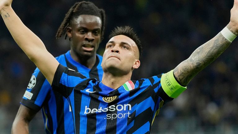 Inter Milan's Lautaro Martinez celebrates after scoring his side's opening goal during the Champions League semifinal second leg soccer match between Inter Milan and Barcelona at San Siro stadium in Milan , Italy, Tuesday, May 6, 2025. (AP Photo/Luca Bruno)