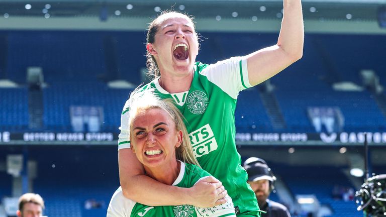 GLASGOW, SCOTLAND - MAY 18: Hibernian's Linzi Taylor and Siobhan Hunter celebrate as they win the league title during a Scottish Women's Premier League match between Rangers and Hibernian at Ibrox Stadium, on May 18, 2025, in Glasgow, Scotland. (Photo by Ross MacDonald / SNS Group)