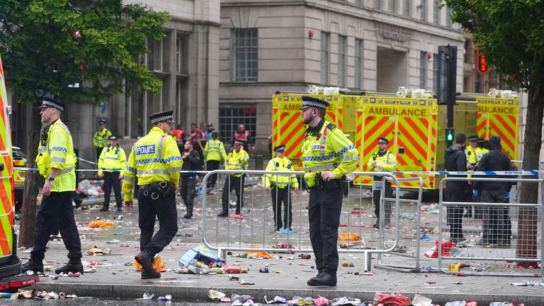 Police and emergency personnel dealing with a road traffic accident on Water Street near the Liver Building in Liverpool after a car collided with pedestrians during the Premier League winners parade. A man has been detained. Picture date: Monday May 26, 2025.