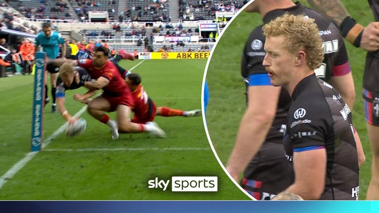 Magic Weekend: Wakefield Trinity's Lochlan Walmsley flies through the air for try