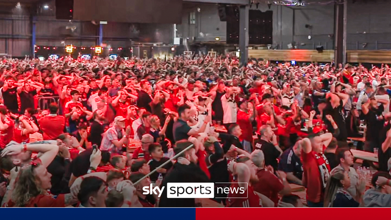 Manchester United fans react to close effort in their Europa League final against Spurs.
