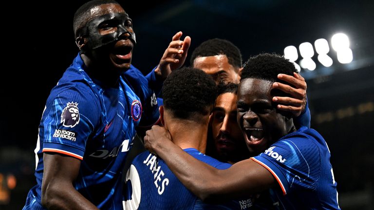 Marc Cucurella is mobbed after scoring the winner against Manchester United