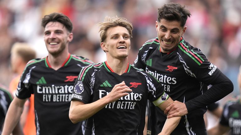 Martin Odegaard celebrates scoring their side's second goal of the game 