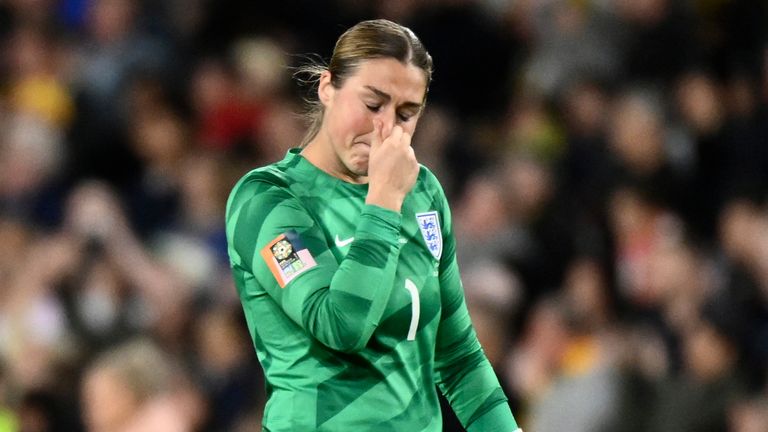 Spain's players celebrate as England's goalkeeper Mary Earps reacts after the Women's World Cup soccer final between Spain and England at Stadium Australia in Sydney, Australia, Sunday, Aug. 20, 2023. (AP Photo/Steve Markham)