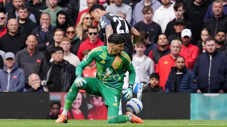 Morgan Rogers kicks the ball away from Altay Bayindir before scoring only for the goal to be disallowed by referee Thomas Bramall