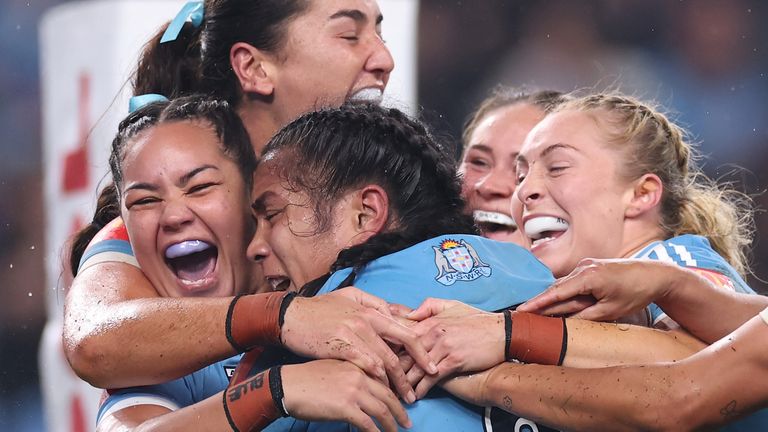 New South Wales celebrate Simaima Taufa's try during their series-clinching victory over Queensland