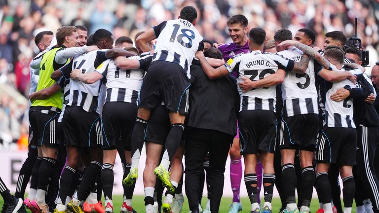 Newcastle players celebrate after qualifying for the UEFA Champions League
