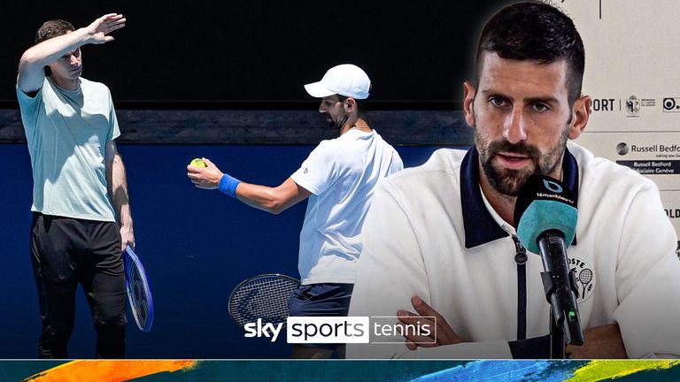 Novak Djokovic talks with his coach Andy Murray