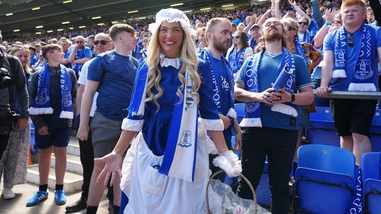 The Everton Toffee Lady hands out sweets ahead of kick-off