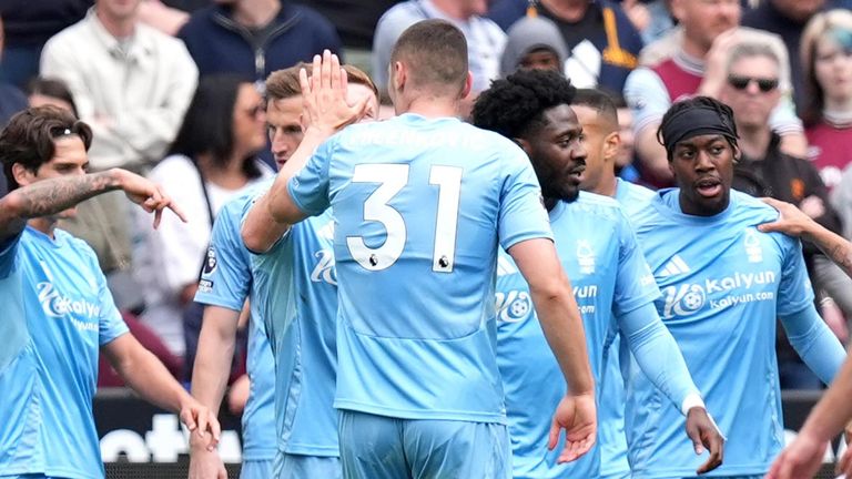 Nikola Milenkovic is congratulated by his team-mates after heading Nottingham Forest into a 2-0 lead at West Ham