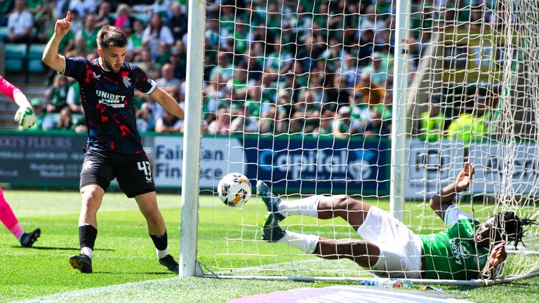 EDINBURGH, SCOTLAND - MAY 17: Rangers believe they have a scored a second through Nicolas Raskin as Rocky Bushiri clears off the line during a William Hill Premiership match between Hibernian and Rangers at Easter Road Stadium, on May 17, 2025, in Edinburgh, Scotland.  (Photo by Sammy Turner / SNS Group)
