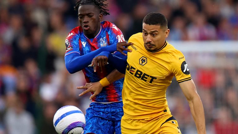 Crystal Palace's Romain Esse battles for the ball with Wolves' Andre