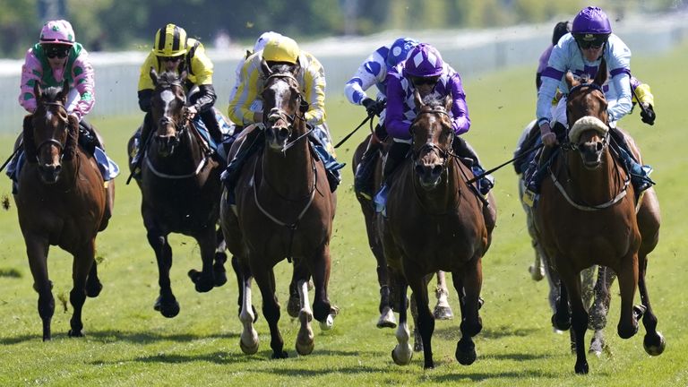 Rousing Encore ridden by James Sullivan on their way to winning the Churchill Tyres Handicap on day one of the Dante festival at York