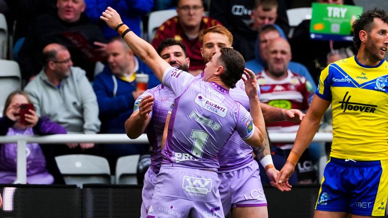 Picture by Olly Hassell/SWpix.com - 04/05/2025 - Rugby League - Betfred Super League, Round 10: Magic Weekend - Warrington Wolves v Wigan Warriors - St. James' Park, Newcastle, England - Jai Field of Wigan celebrating his try