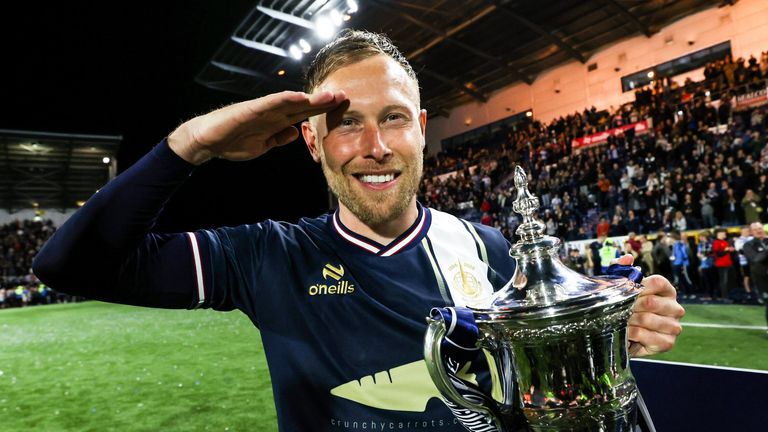FALKIRK, SCOTLAND - MAY 02: Falkirk...s Scott Arfield celebrates with the William Hill Championship Trophy during a William Hill Championship match between Falkirk and Hamilton Academical at the Falkirk Stadium, on May 02, 2025, in Falkirk, Scotland. (Photo by Craig Williamson / SNS Group)