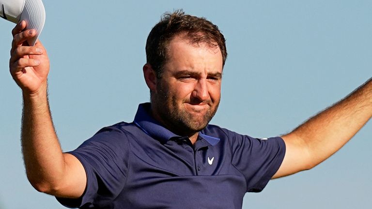 Scottie Scheffler celebrates after winning the PGA Championship golf tournament at the Quail Hollow Club, Sunday, May 18, 2025, in Charlotte, N.C. (AP Photo/George Walker IV) 