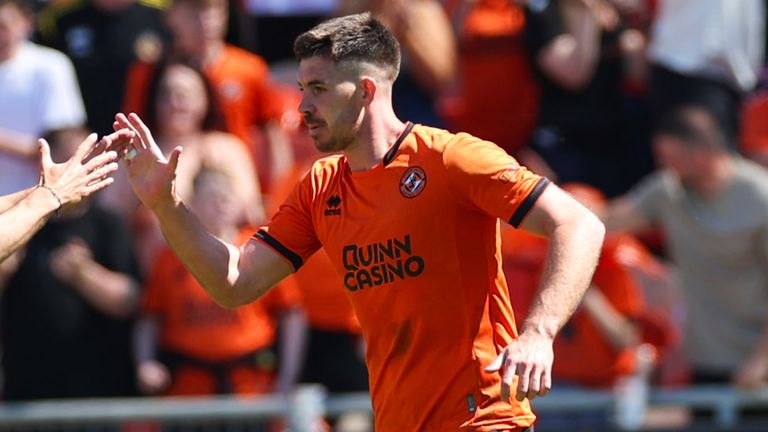 Declan Gallagher celebrates after equalising for Dundee United against Aberdeen