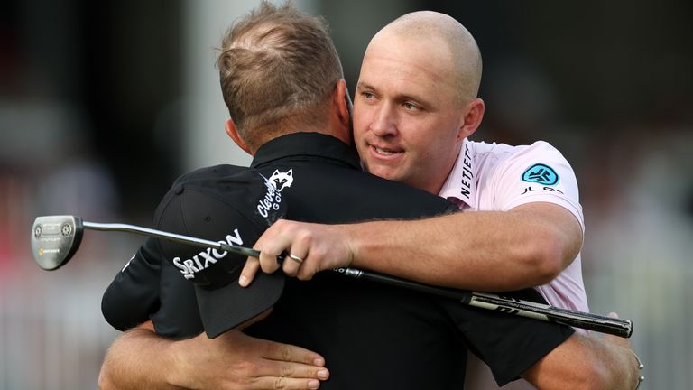 Shane Lowry congratulates Truist Championship winner Sepp Straka after the Austrian's win