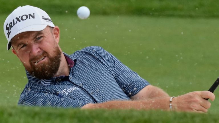 Shane Lowry hits onto the 10th green during the first round of the Memorial golf tournament Thursday, May 29, 2025, in Dublin, Ohio. (AP Photo/Sue Ogrocki)