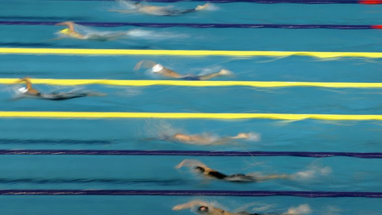 Swimming's world governing body FINA voted to restrict the participation of transgender athletes in elite women's competitions and create a working group to establish an "open" category in June 2022