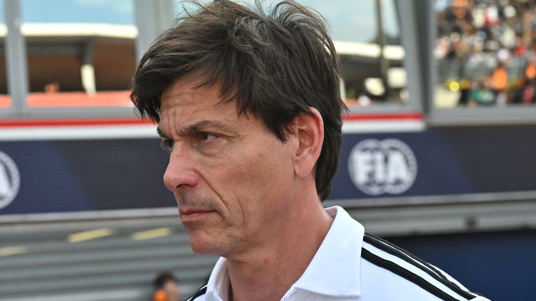 Mercedes' Austrian team principal and CEO Toto Wolff (R) walks down the pit lane at the end of the qualifying session for the Formula One Monaco Grand Prix at the Circuit de Monaco, on May 24, 2025. (Photo by Andrej ISAKOVIC / AFP)