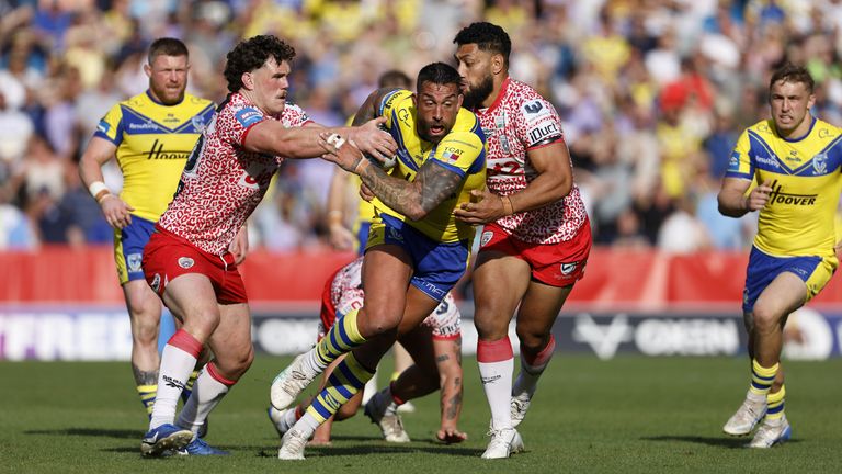 Warrington Wolves' Paul Vaughan is tackled during the Betfred Challenge Cup semi-final match
