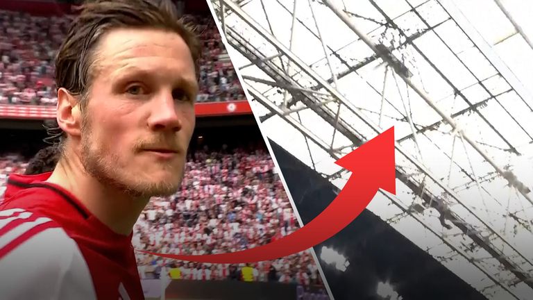 Ajax forward Wout Weghorst appeared to not be happy with the presence of the camera as he pushed it away whilst he and the team having a moment with the fans after losing out on the league title. Images: IMG Media