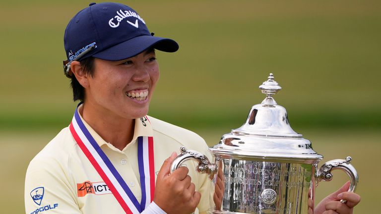 Yuka Saso, of Japan, holds the tournament trophy after winning the U.S. Women's Open golf tournament at Lancaster Country Club, Sunday, June 2, 2024, in Lancaster, Pa. (AP Photo/Matt Slocum)