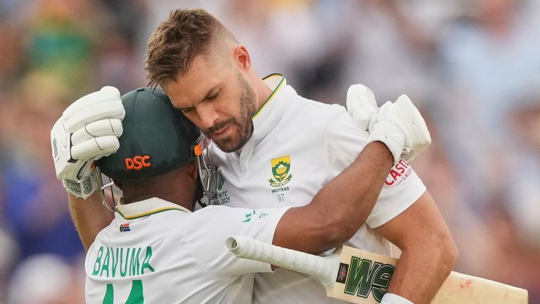 South Africa's Aiden Markram, right, celebrates with batting partner Temba Bavuma after scoring a century on day three of the World Test Cha