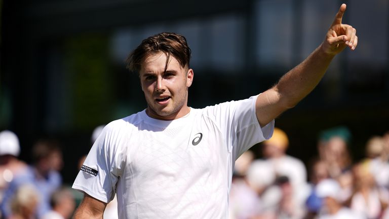 Arthur Fery celebrates winning his match against Alexei Popyrin on day one of the 2025 Wimbledon Championships at the All England Lawn Tenni