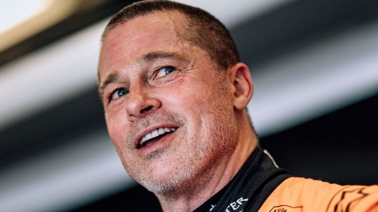 Brad Pitt driving a McLaren at COTA