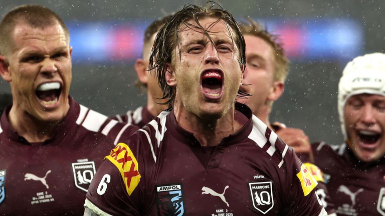 Maroons Cameron Munster (C) celebrates a try with teammates during game two of the men's State of Origin series between Queensland Maroons and New South Wales Blues at Optus Stadium in Perth on June 18, 2025. (Photo by COLIN MURTY / AFP) / -- IMAGE RESTRICTED TO EDITORIAL USE - STRICTLY NO COMMERCIAL USE --