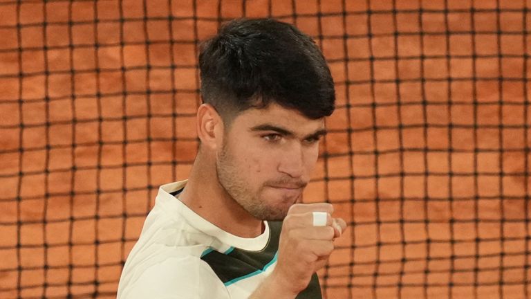 Spain's Carlos Alcaraz celebrates as he won the quarterfinal match of the French Tennis Open against Tommy Paul of the U.S. at the Roland-Garros stadium in Paris, Tuesday, June 3, 2025. (AP Photo/Thibault Camus)