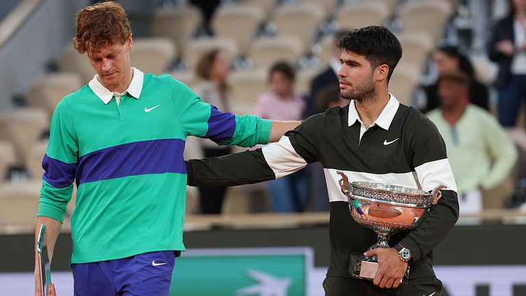 Carlos Alcaraz consoles Jannik Sinner after their incredible French Open final duel